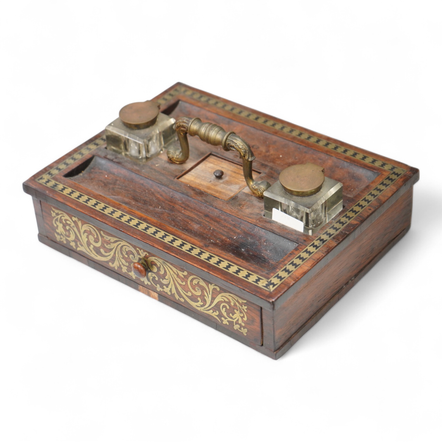 A George IV rosewood and cut brass inlaid two desk top inkstand, 29cm wide x 22cm deep